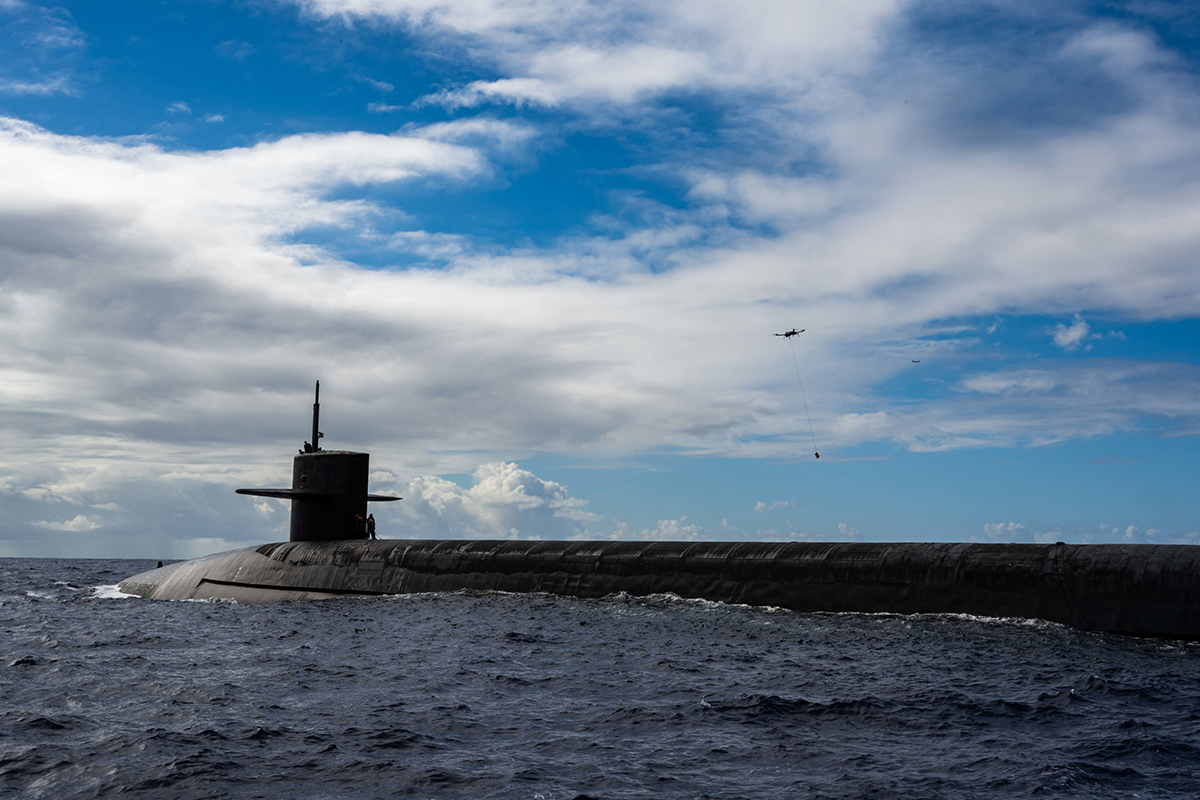 Another shot of an unmanned aerial vehicle with the submarine USS Henry M. Jackson (SSBN 730).