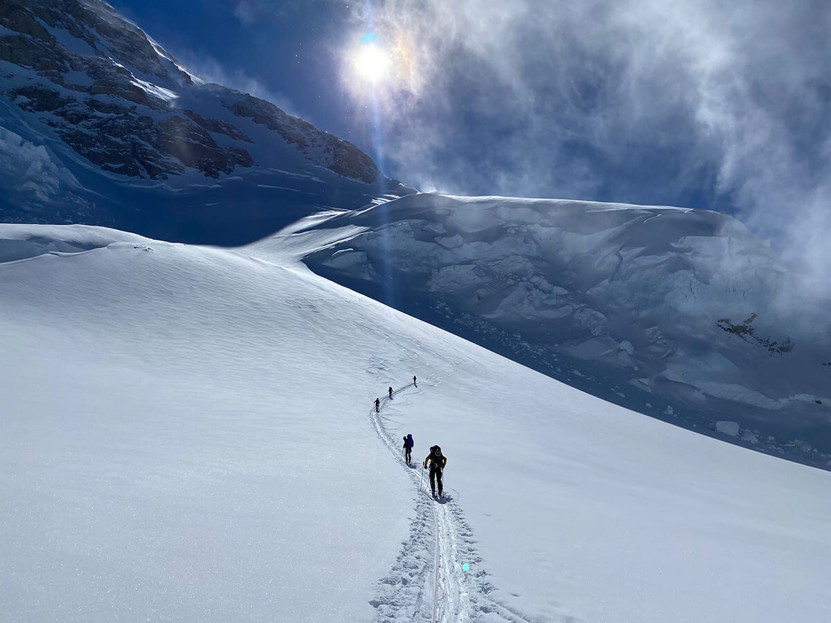 team treking throught the mountains