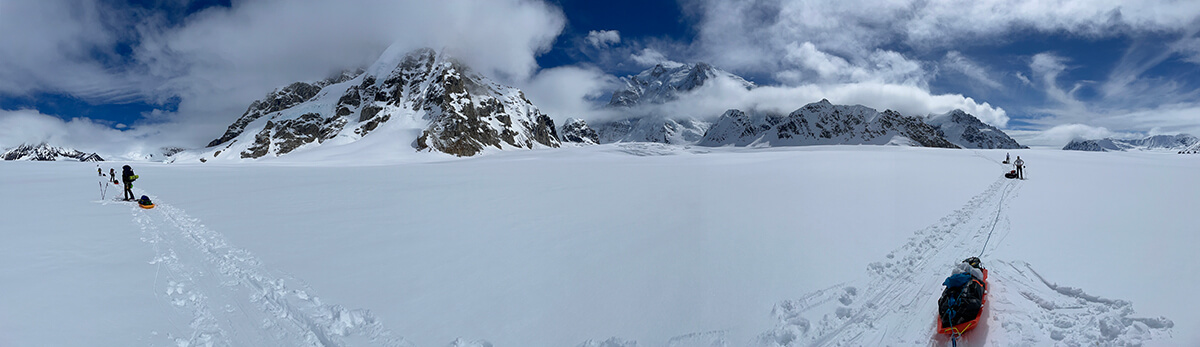 panoramic view of team on mountain