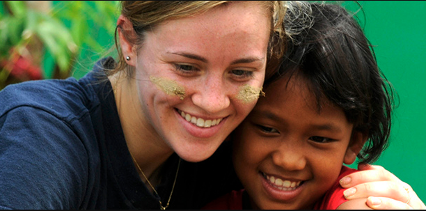 Smiling woman and child